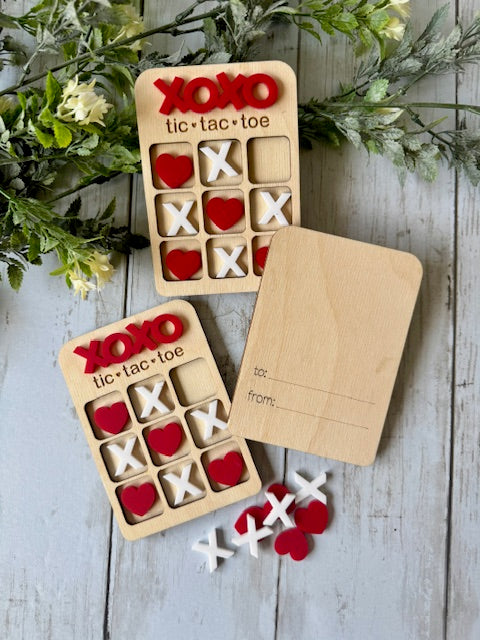 Valentine Tic Tac Toe with X and O pieces and a To & From spot on the Back made by Relatively Made Laser Designs
