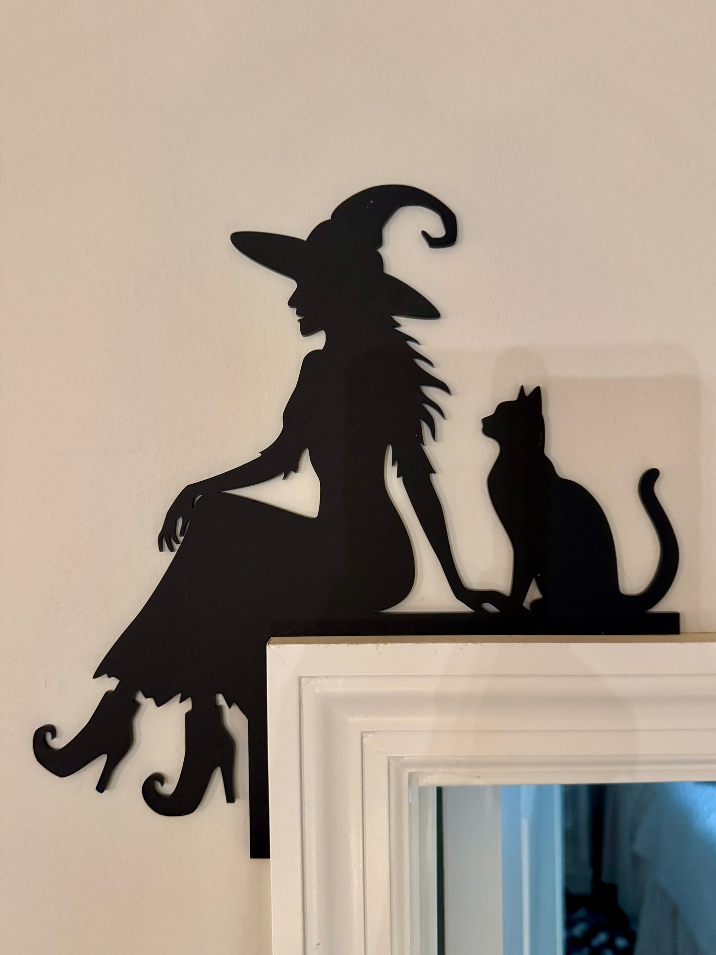 Witch and Catch Door Corner made from black acrylic